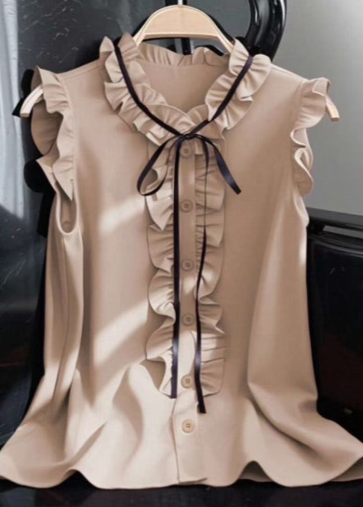 Ruffled Sleeveless Blouse in Cream