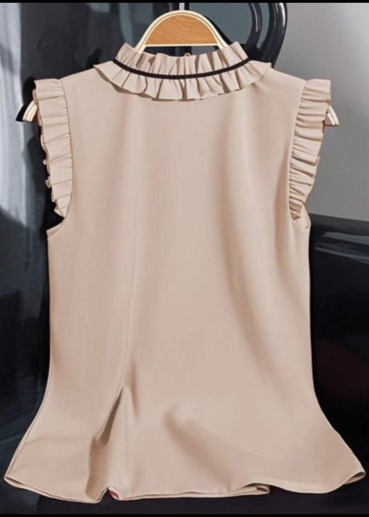 Ruffled Sleeveless Blouse in Cream